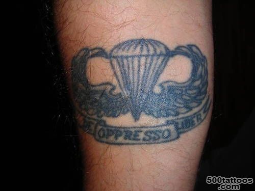 Subtle illustrative airborne tattoo design on the inner arm