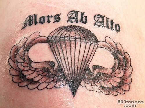Traditional airborne tattoo with elegant linework on the spine