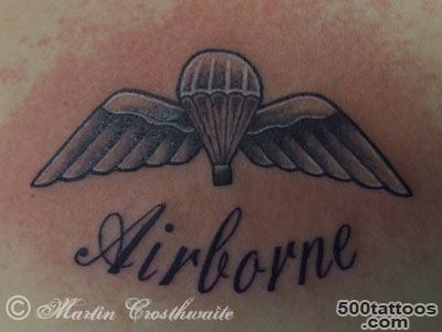 Subtle airborne tattoo in blackwork style on the inner arm