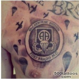 Traditional airborne tattoo with powerful linework on the wrist