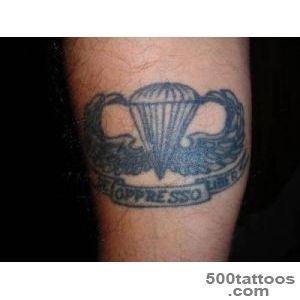 Subtle illustrative airborne tattoo design on the inner arm