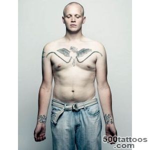 Ornamental airborne tattoo featuring expressive execution on the calf