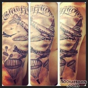 A neo-traditional airborne tattoo on the wrist with powerful detail