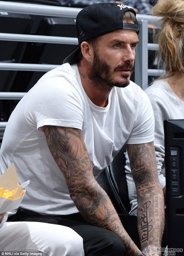 David Beckham#39s wife Victoria debuts his latest tattoo designed by ..._17
