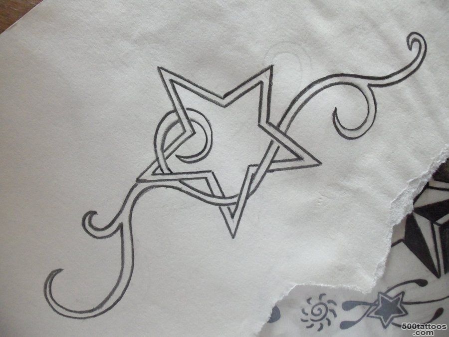 Subtle fine-line drawn tattoo design on the inner arm