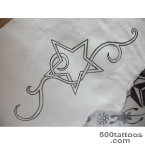 Subtle fine-line drawn tattoo design on the inner arm