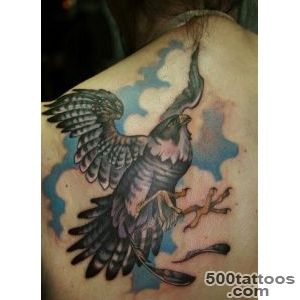 Wonderful detailed falcon tattoo on back   Tattooimagesbiz_37