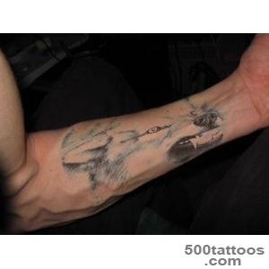Grin of wolf tattoo on the arm   Tattooimagesbiz_37