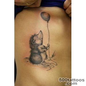 Beautiful color ink hedgehog tattoo on upper arm   Tattooimagesbiz_30