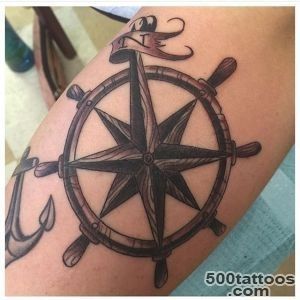 Mantra Tattoo — Wood grain ship helm tattoo done by_9