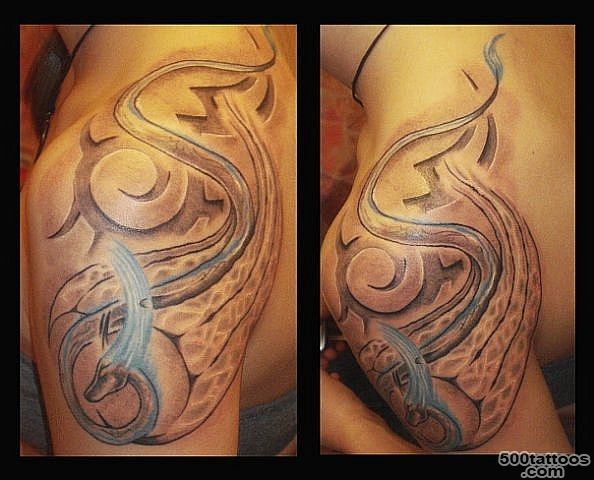 Beautiful tattoo of a thin dragon with magical glow on his head ..._25