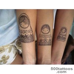 Interesting black and white sleeping Matryoshka tattoo on arm _36