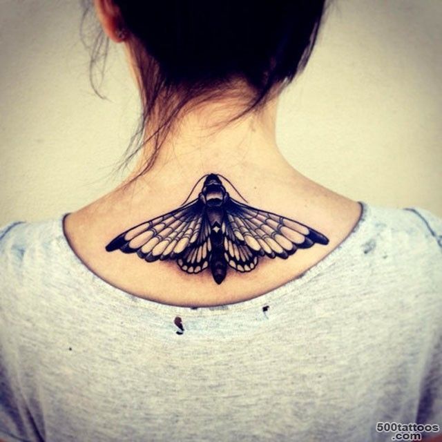 Black and white detailed mole butterfly tattoo on upper back ..._42