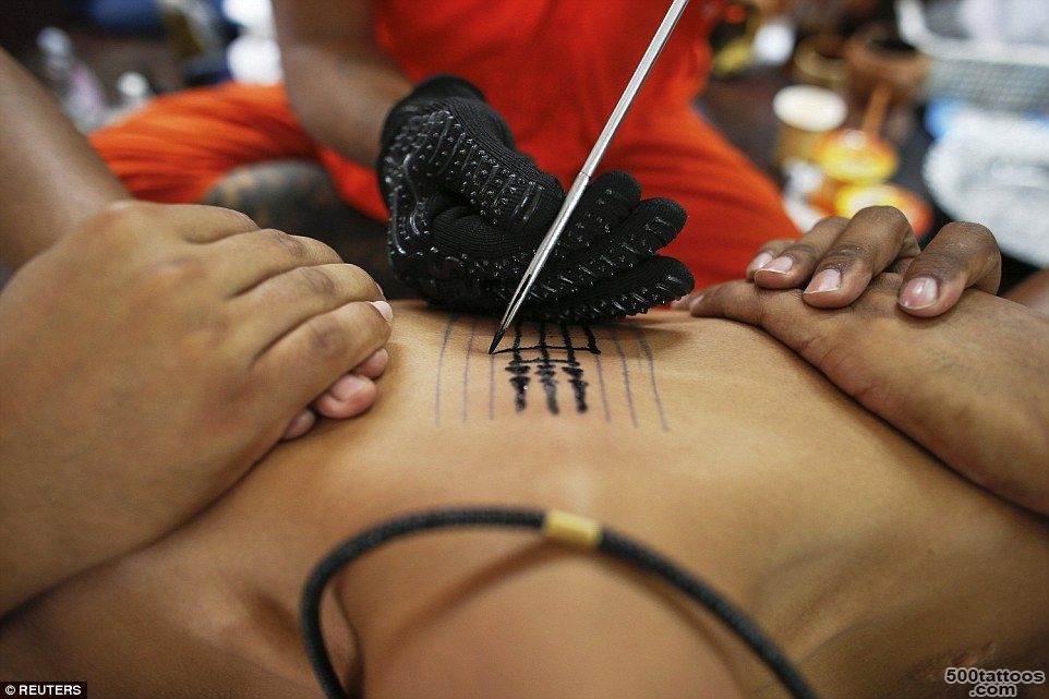 Sak Yant#39 festival brings together devotees of the tattooing ..._40