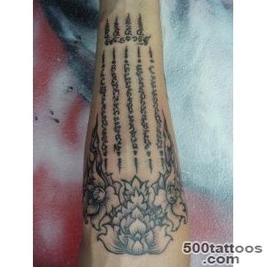Wonderful Flowers With Muay Thai Bamboo Style Tattoo On Forearm_38