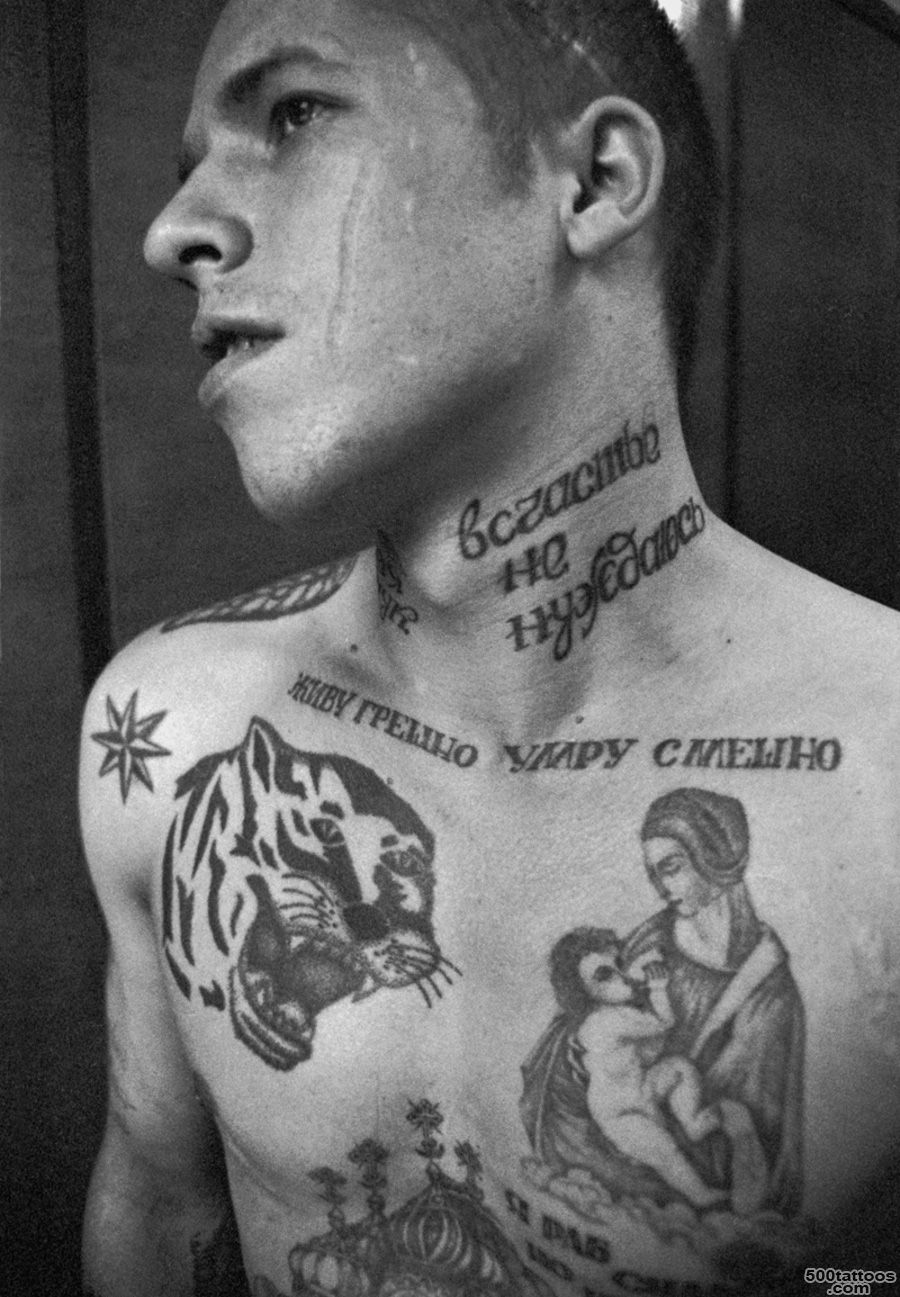 Russian tattoo in bold abstract style on the neck