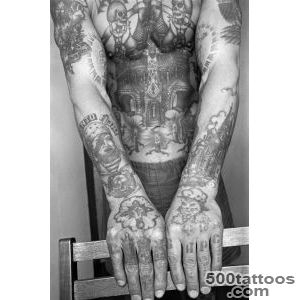 Ornamental russian tattoo featuring clean execution on the forearm