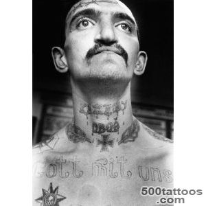 Refined russian tattoo in watercolor style on the shoulder