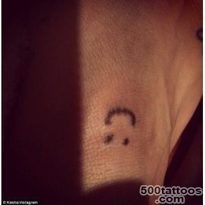 Kesha celebrates New Year by getting smiley face tattoo  Daily _25