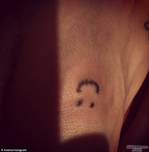 Kesha celebrates New Year by getting smiley face tattoo  Daily ..._25