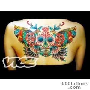 Crisp illustrative tattoo age tattoo design on the upper arm