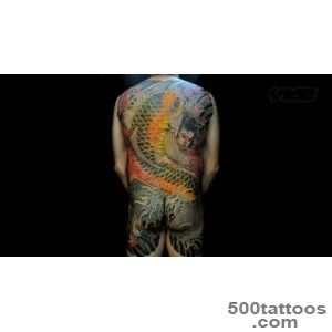 A tribal tattoo age tattoo on the spine with elegant detail