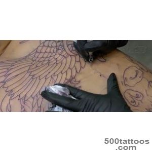 Tattoo age tattoo in subtle abstract style on the inner arm