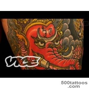 Black and grey tattoo age tattoo with expressive linework on the calf