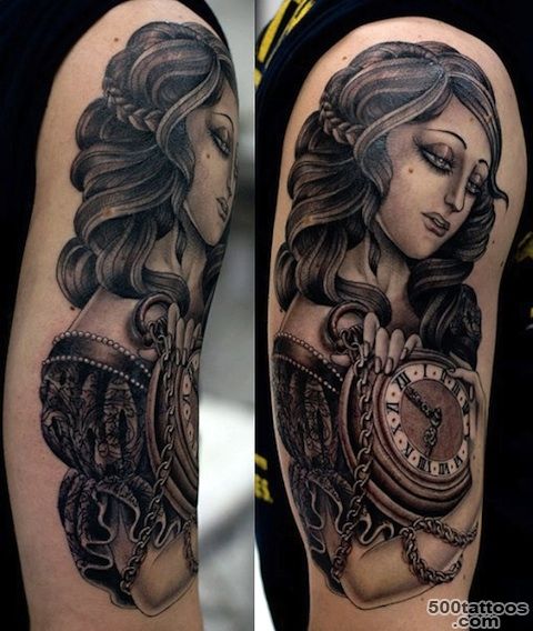 Black and grey tattoo age tattoo with dynamic linework on the chest