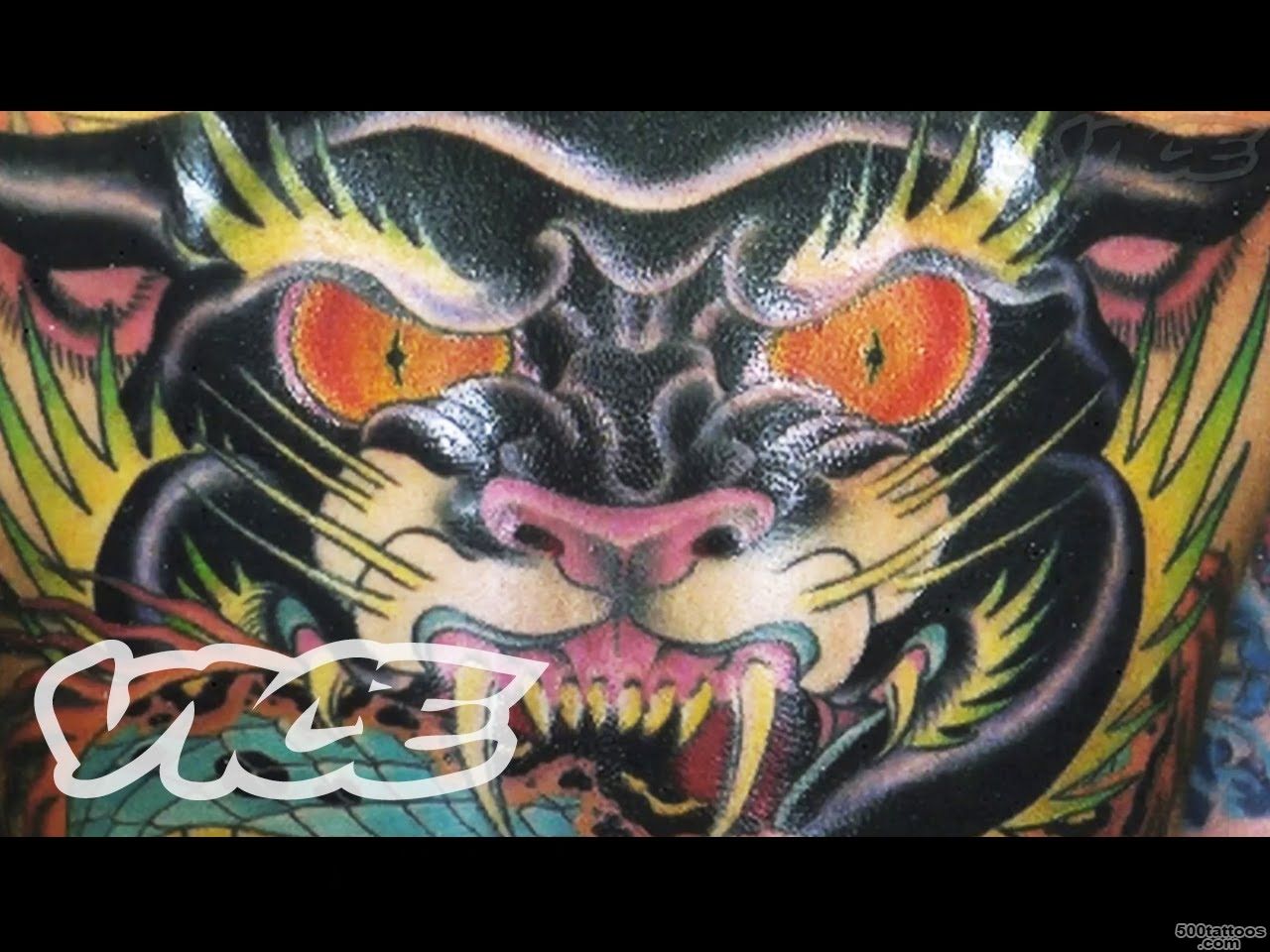 Traditional tattoo age tattoo with intricate linework on the collarbone