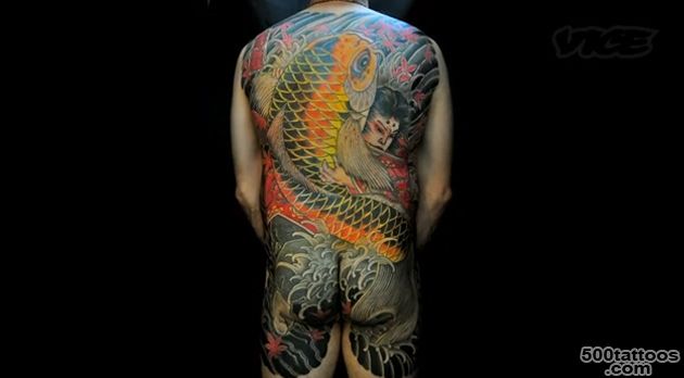 A tribal tattoo age tattoo on the spine with elegant detail