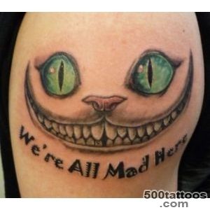 Creepy cheshire cat tattoo in skin rip   Tattooimagesbiz_9