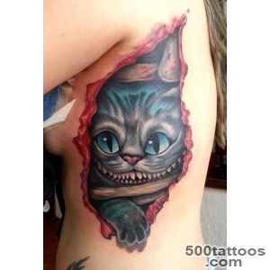 Creepy cheshire cat tattoo in skin rip   Tattooimagesbiz_16