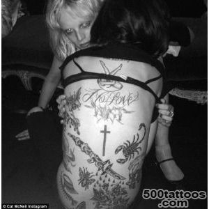 Cat McNeil proudly shows off growing number of tattoos on her back _6