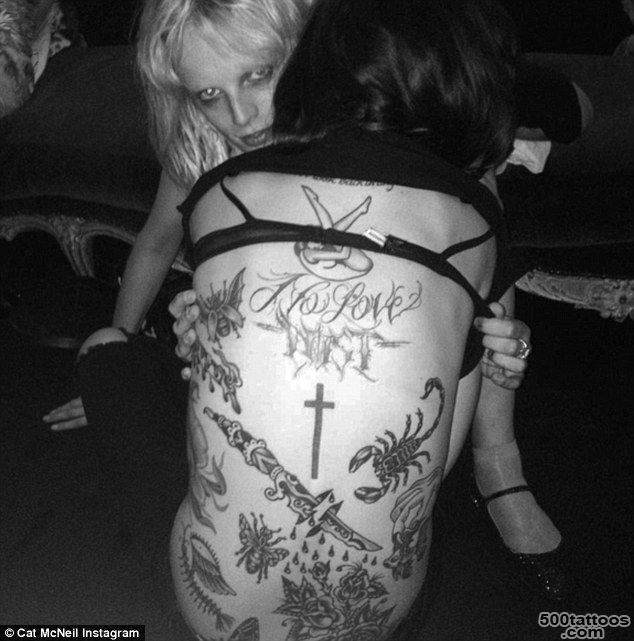 Cat McNeil proudly shows off growing number of tattoos on her back ..._6