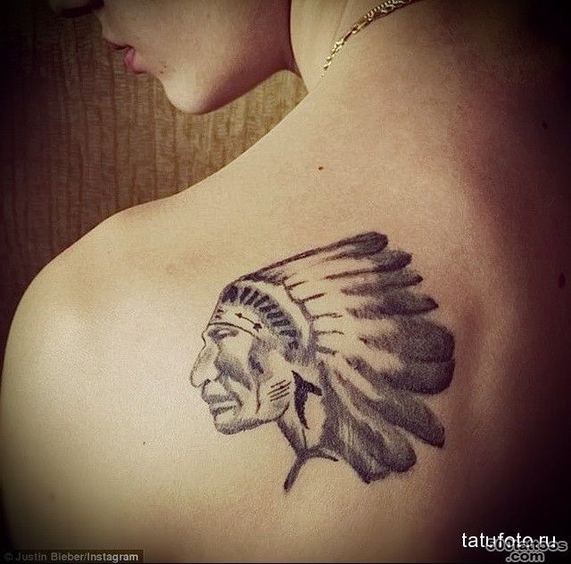 Indian tattoo on her back   tatufoto.ru_9
