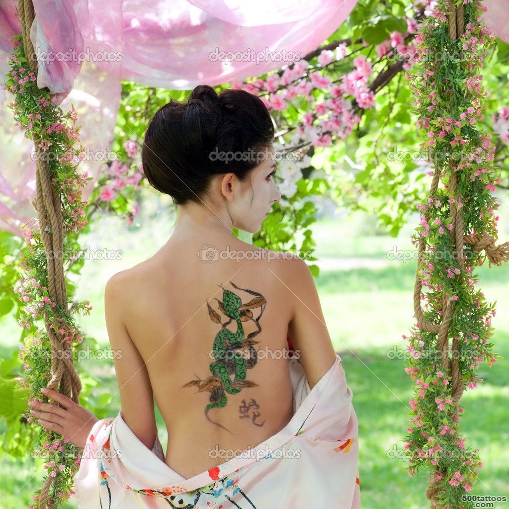 Woman With Snake Tattoo On Her Back In The Garden   Tattoes Idea ..._49