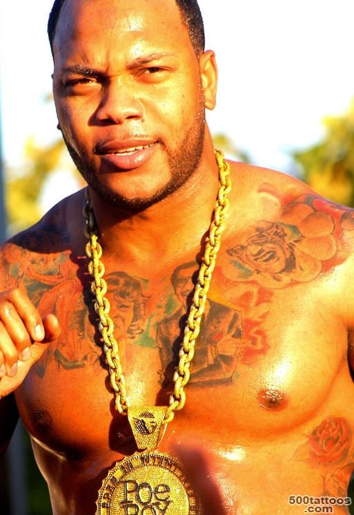 Rapper Flo Rida showing the tattoos on his chest and ribs ..._21