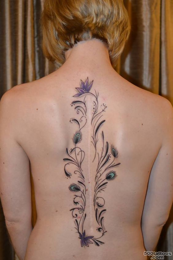 I got this tattoo to disguise the scar on my back from back ..._12