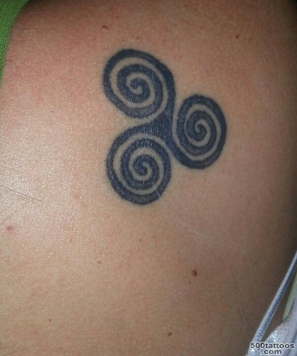 Triple Spiral With Lettering Tattoo On Upper Back_29