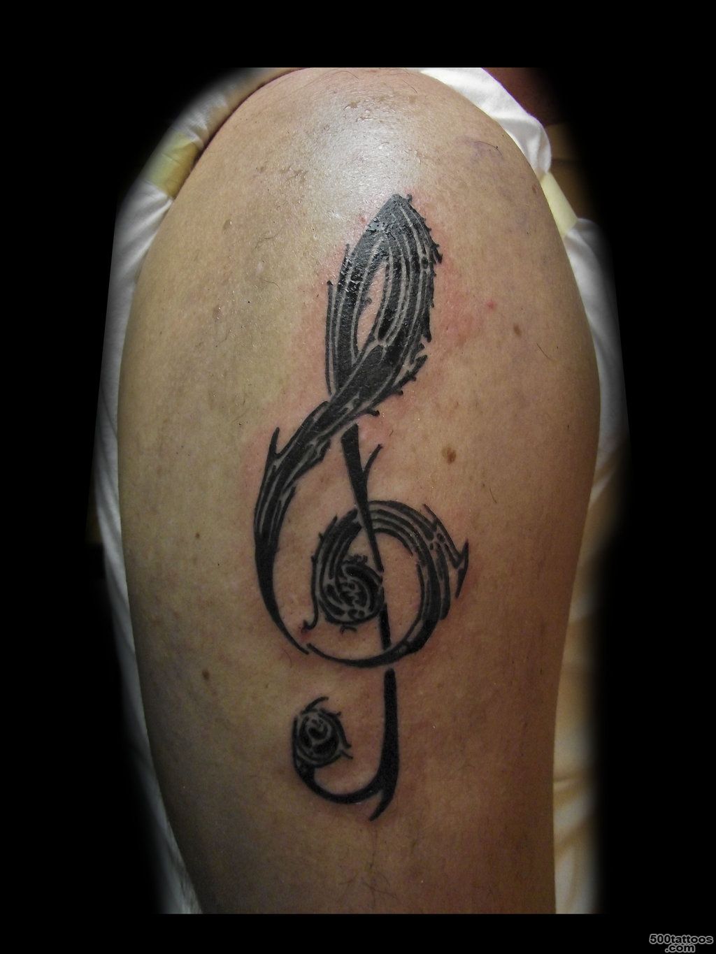 Black Ink Violin Key Music Tattoo On Leg_19