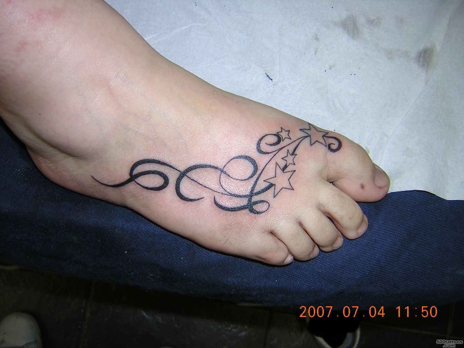 Flower women tattoo on foot designs_39