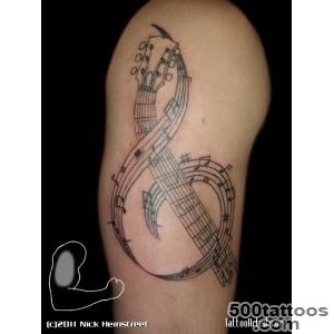 music tattoo but the stem of the treble clef as a music staff as _31