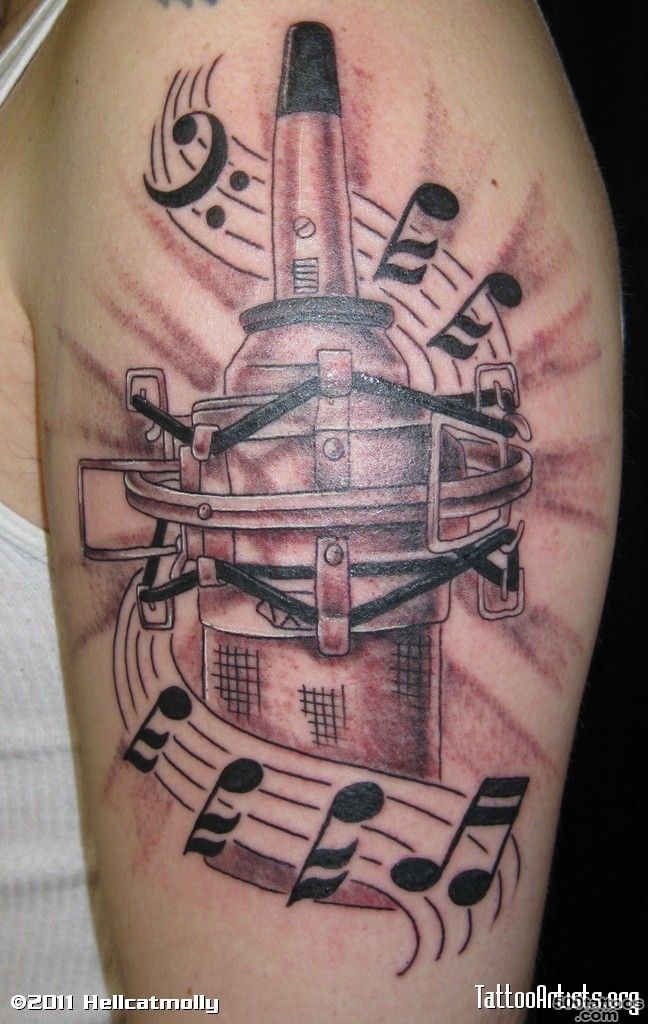 Unusual designed music themed massive tattoo on shoulder   Tattoos ..._21