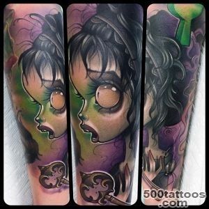 Cartoon like colored evil witch tattoo on forearm with antic key _35